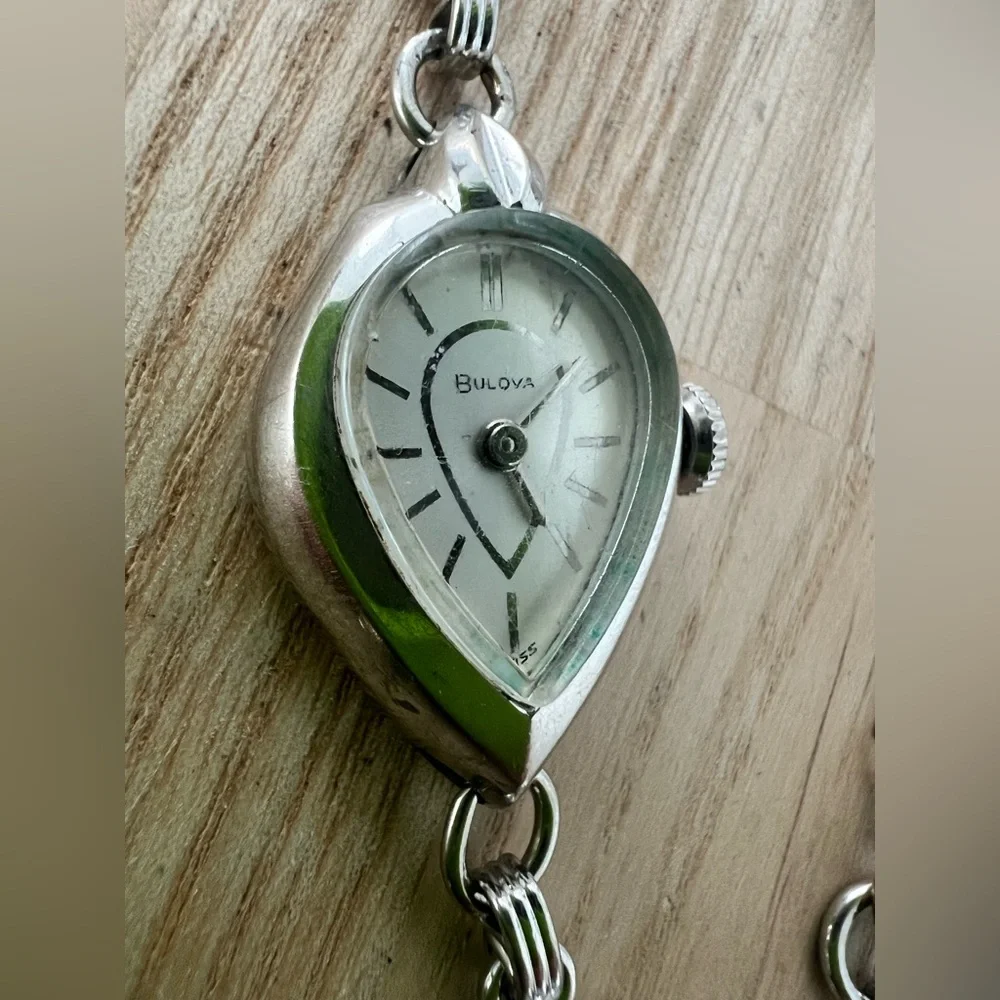 Vintage Bulova ladies teardrop shaped white gold filled mechanical watch